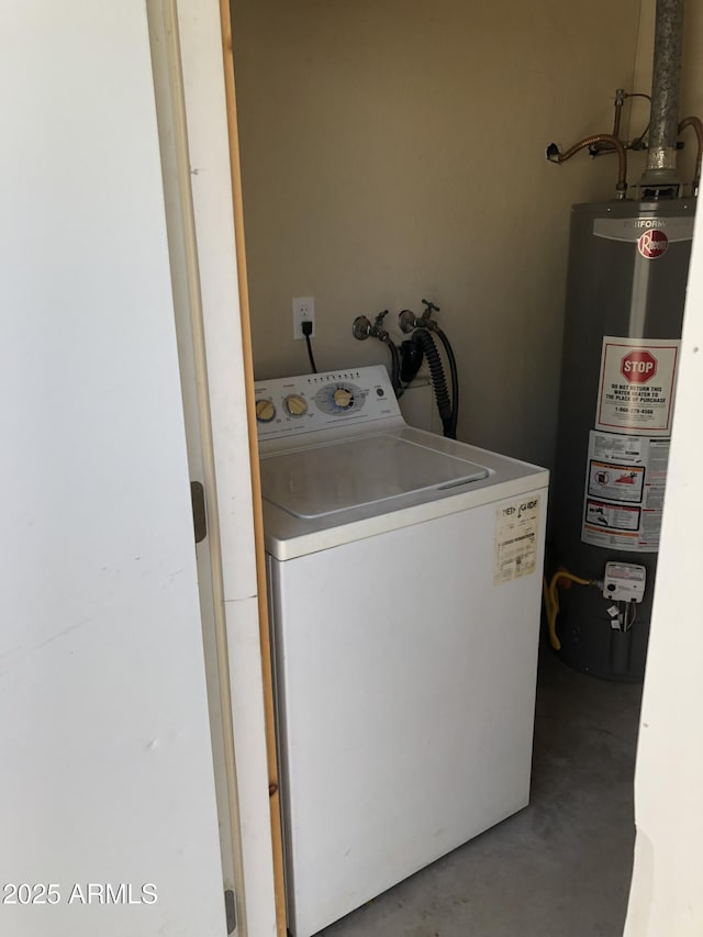 laundry area with water heater, laundry area, and washer / dryer