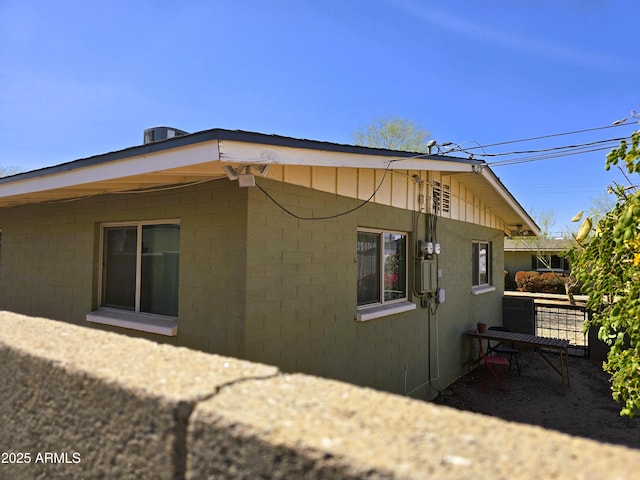 view of property exterior with cooling unit