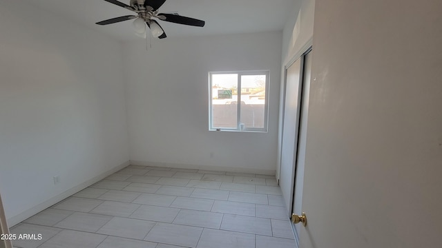 empty room with ceiling fan