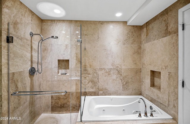 bathroom featuring plus walk in shower