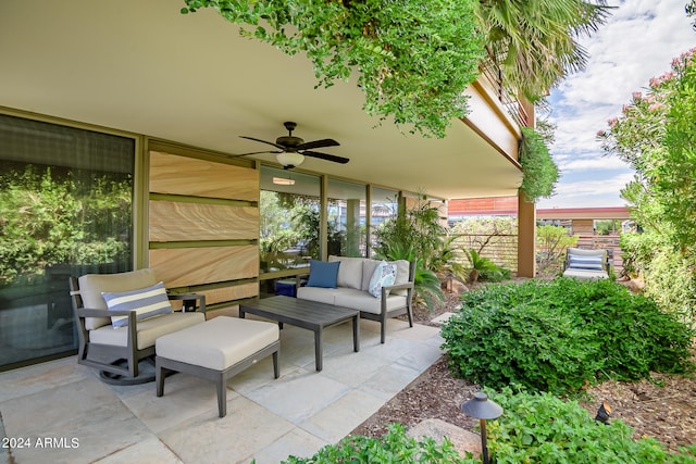 view of patio featuring an outdoor hangout area and ceiling fan