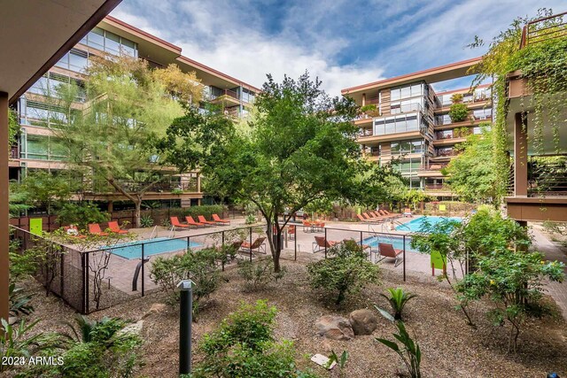 view of swimming pool with a patio