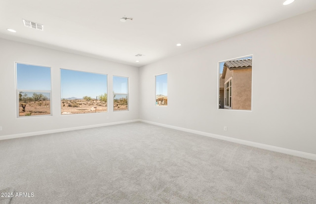 18716 N 269th Ln, Buckeye, AZ 85396 - carpeted spare room featuring healthy amount of natural light, recessed lighting, and baseboards