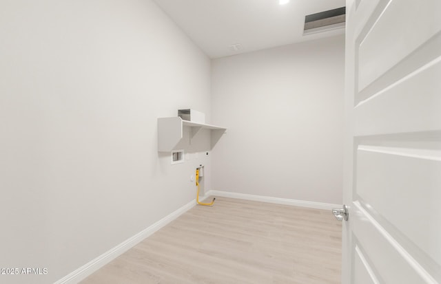 18716 N 269th Ln, Buckeye, AZ 85396 - laundry room with gas dryer hookup, hookup for a washing machine, baseboards, and light wood finished floors