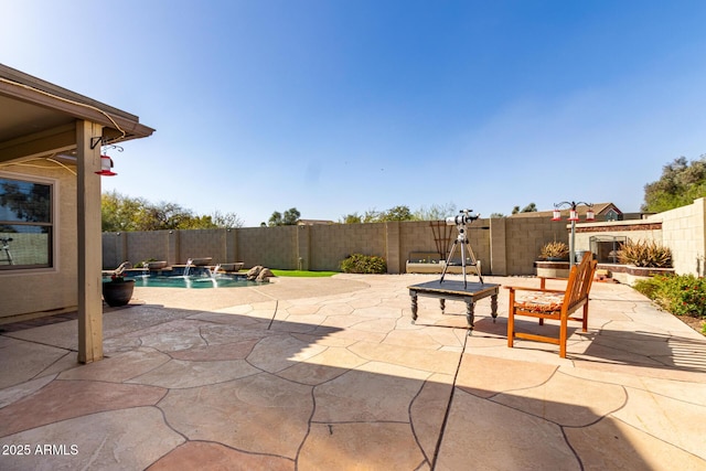 view of patio with a fenced backyard and a fenced in pool