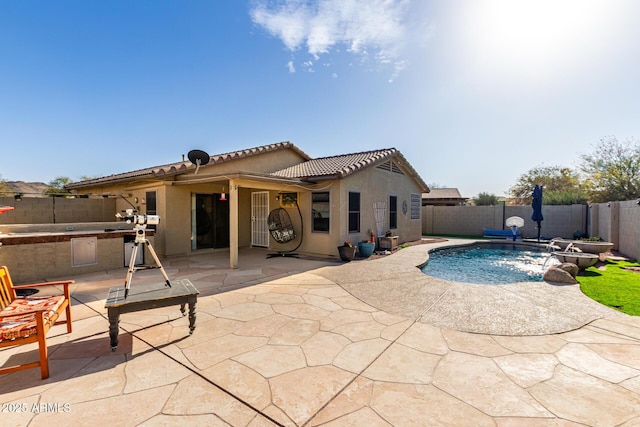 view of pool featuring a fenced in pool, a patio area, and a fenced backyard