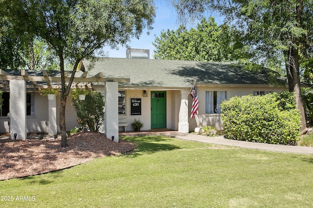 430 N Vineyard, Mesa, AZ 85201 - ranch-style house featuring a shingled roof, stucco siding, a chimney, and a front lawn