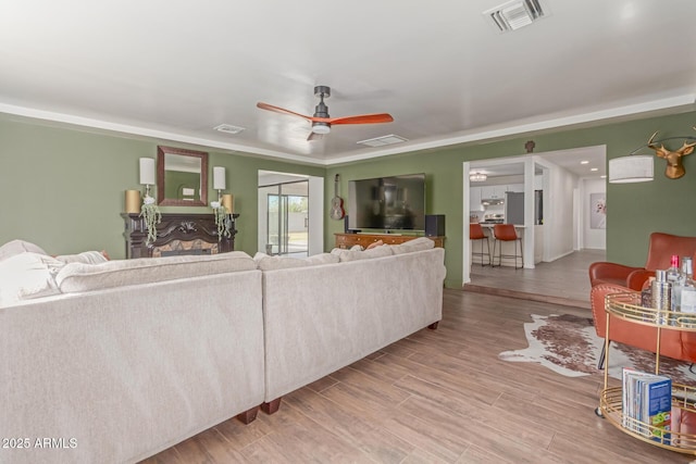430 N Vineyard, Mesa, AZ 85201 - living room with visible vents, a ceiling fan, and wood finished floors