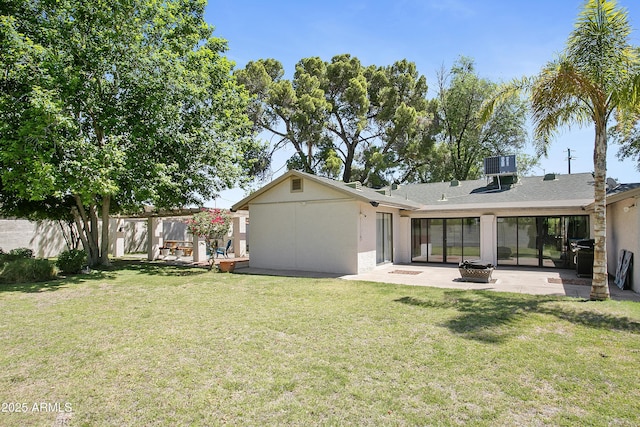 430 N Vineyard, Mesa, AZ 85201 - back of property with a lawn, fence, a patio, and stucco siding