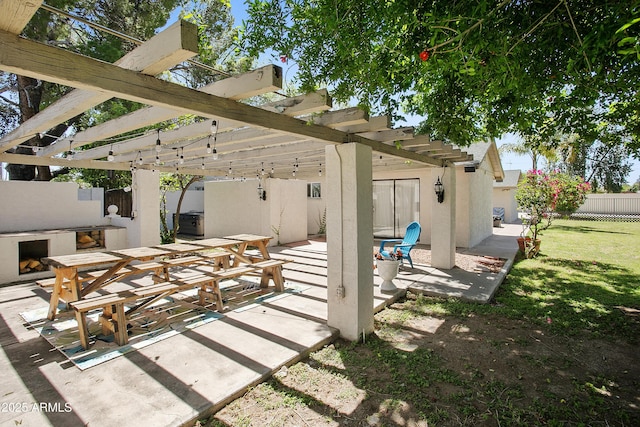 430 N Vineyard, Mesa, AZ 85201 - view of patio featuring an outdoor fireplace, fence, and a pergola