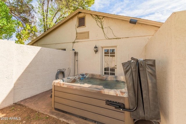 430 N Vineyard, Mesa, AZ 85201 - view of patio / terrace with a hot tub and fence