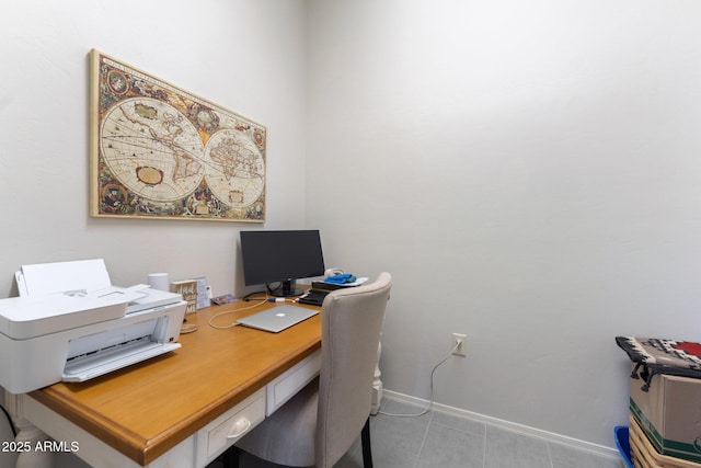 office featuring baseboards and tile patterned flooring