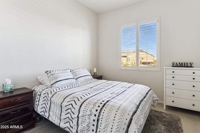 bedroom featuring tile patterned flooring