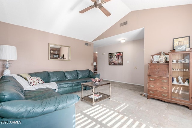 tiled living room with ceiling fan and lofted ceiling