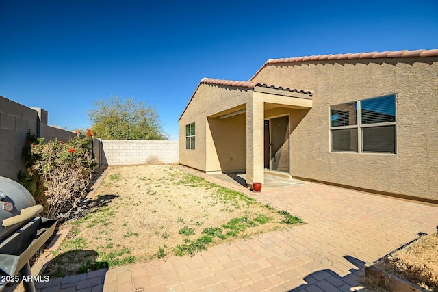 rear view of property with a patio