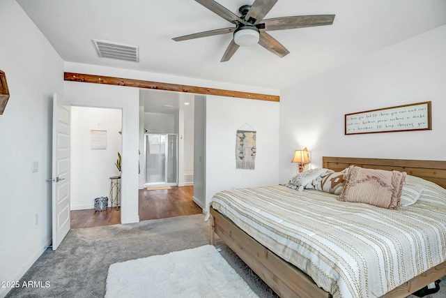 carpeted bedroom with ceiling fan