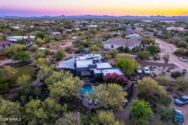 view of aerial view at dusk