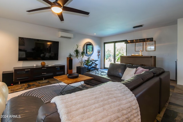 living room featuring ceiling fan and a wall unit AC