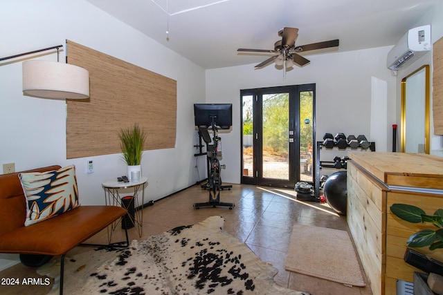 tiled entryway with ceiling fan and a wall unit AC