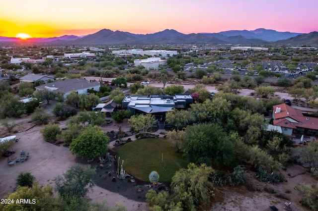 aerial view at dusk with a mountain view