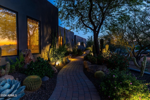 view of patio terrace at dusk