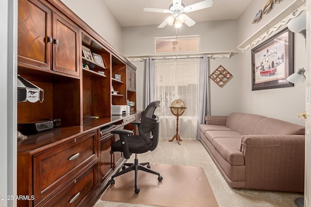 office with ceiling fan and carpet floors