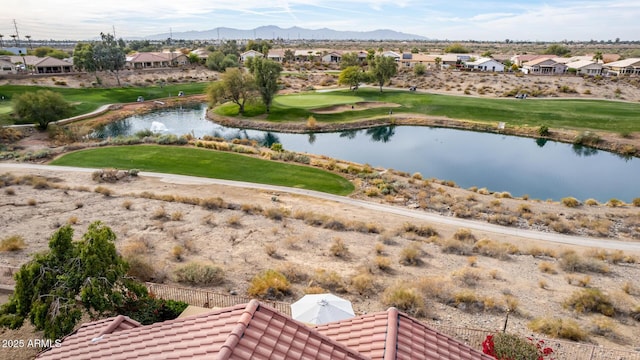 exterior space featuring a water and mountain view