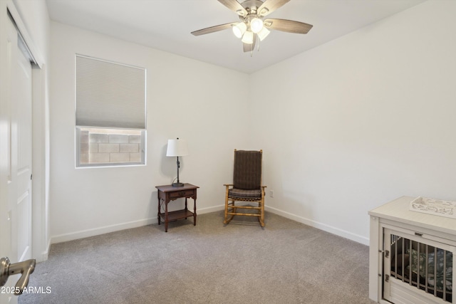 1135 E Barrus Dr, Casa Grande, AZ 85122 - living area featuring a ceiling fan, carpet, and baseboards