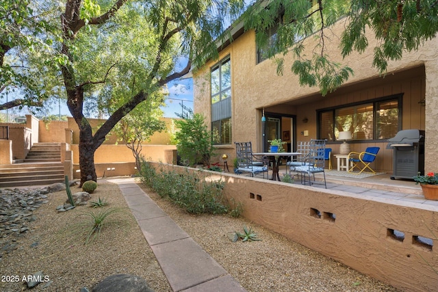 exterior space with a patio