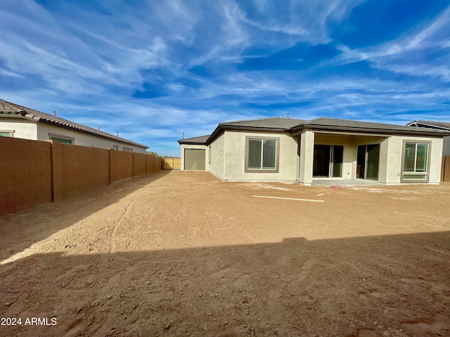 rear view of house with a patio area