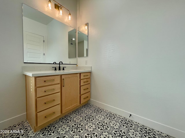 bathroom featuring tile patterned floors and vanity