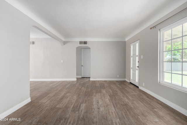 spare room with hardwood / wood-style floors