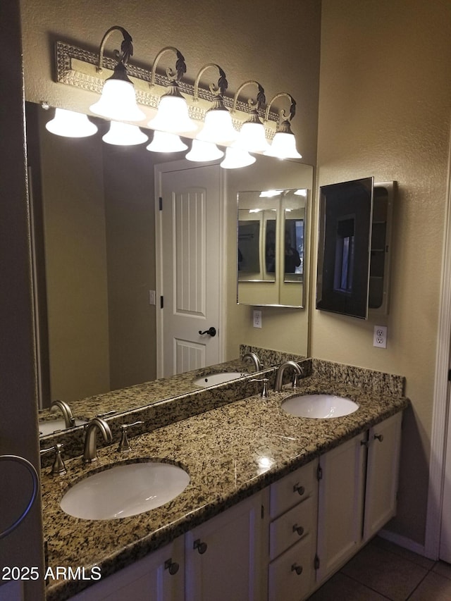 bathroom featuring vanity and tile patterned floors