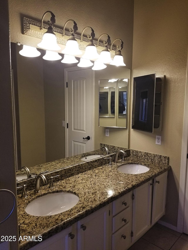 bathroom with vanity and tile patterned floors