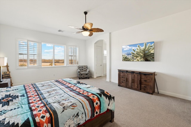 bedroom featuring ceiling fan and light colored carpet