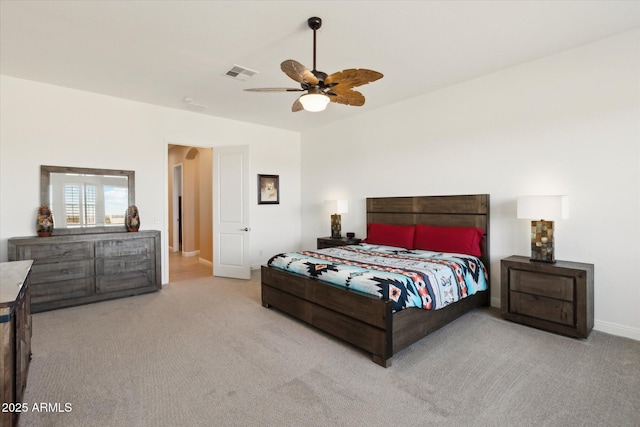 bedroom featuring light carpet and ceiling fan