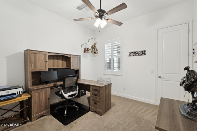 carpeted home office with ceiling fan