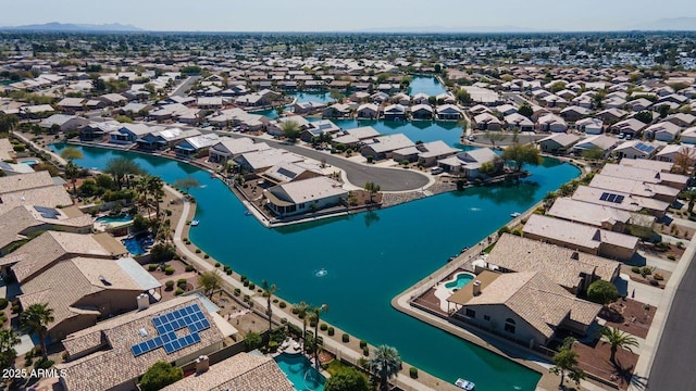 aerial view with a residential view and a water view