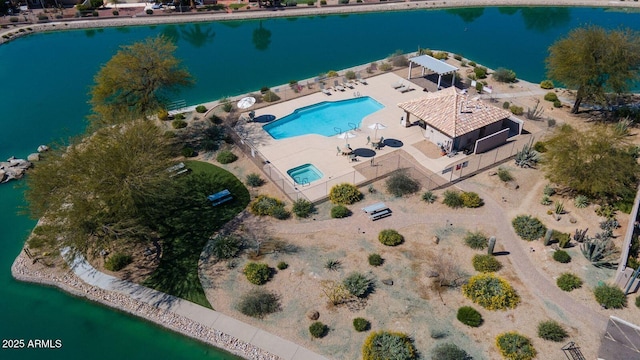 bird's eye view with a water view