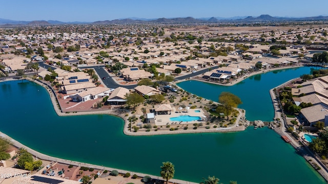 aerial view with a residential view and a water and mountain view