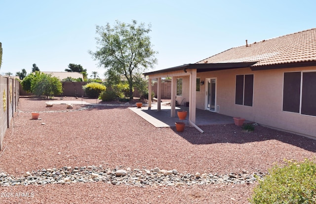 view of yard featuring a patio and a fenced backyard