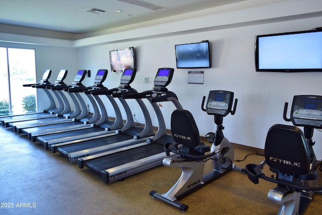 workout area featuring visible vents and baseboards