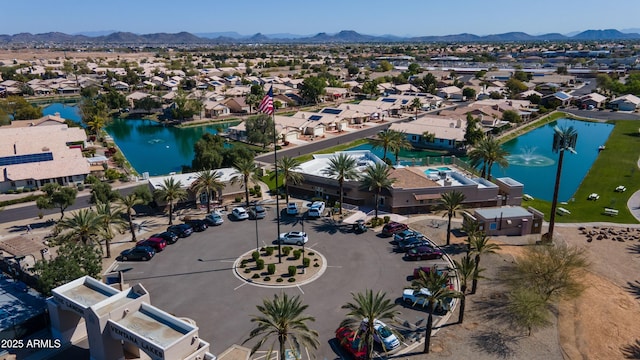 birds eye view of property with a residential view and a water and mountain view