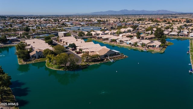 aerial view featuring a residential view and a water and mountain view