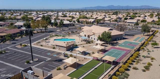 drone / aerial view featuring a mountain view and a residential view