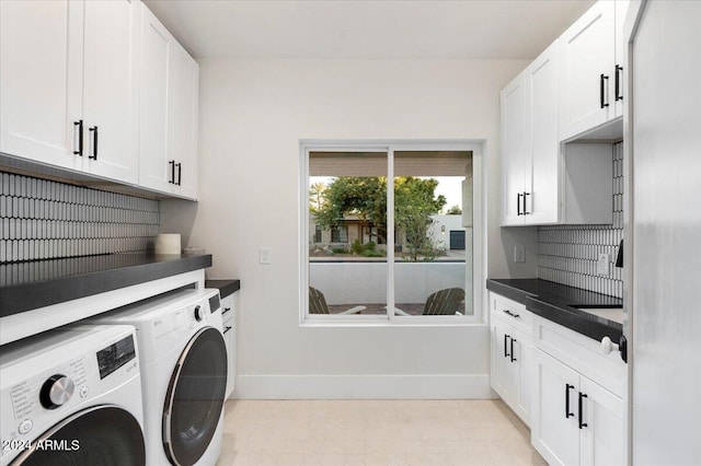 laundry room with cabinets and independent washer and dryer