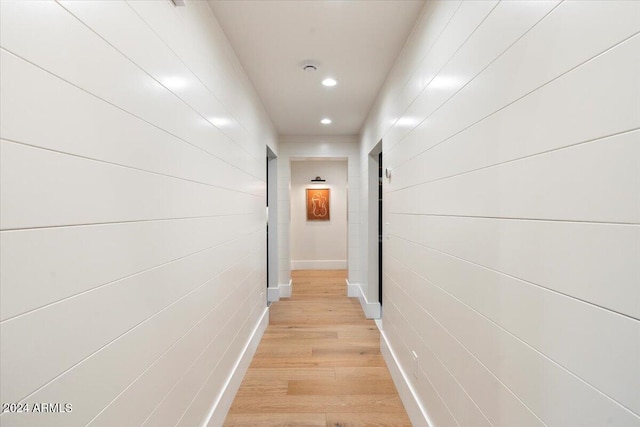 corridor featuring light hardwood / wood-style flooring