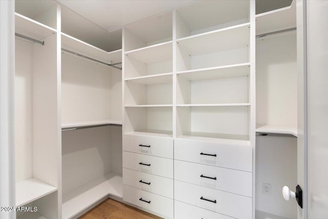 8014 E Del Tesoro Dr, Scottsdale, AZ 85258 - walk in closet featuring light wood-type flooring