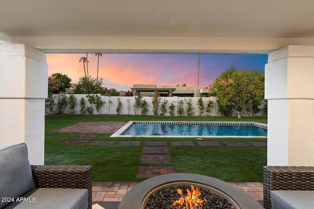 8014 E Del Tesoro Dr, Scottsdale, AZ 85258 - pool at dusk with an outdoor fire pit