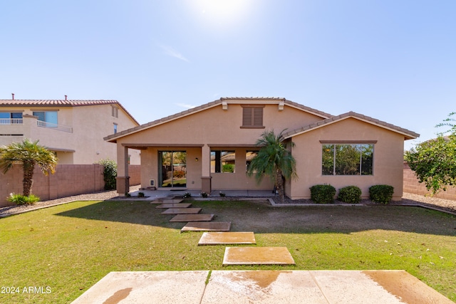 view of front of home with a front yard